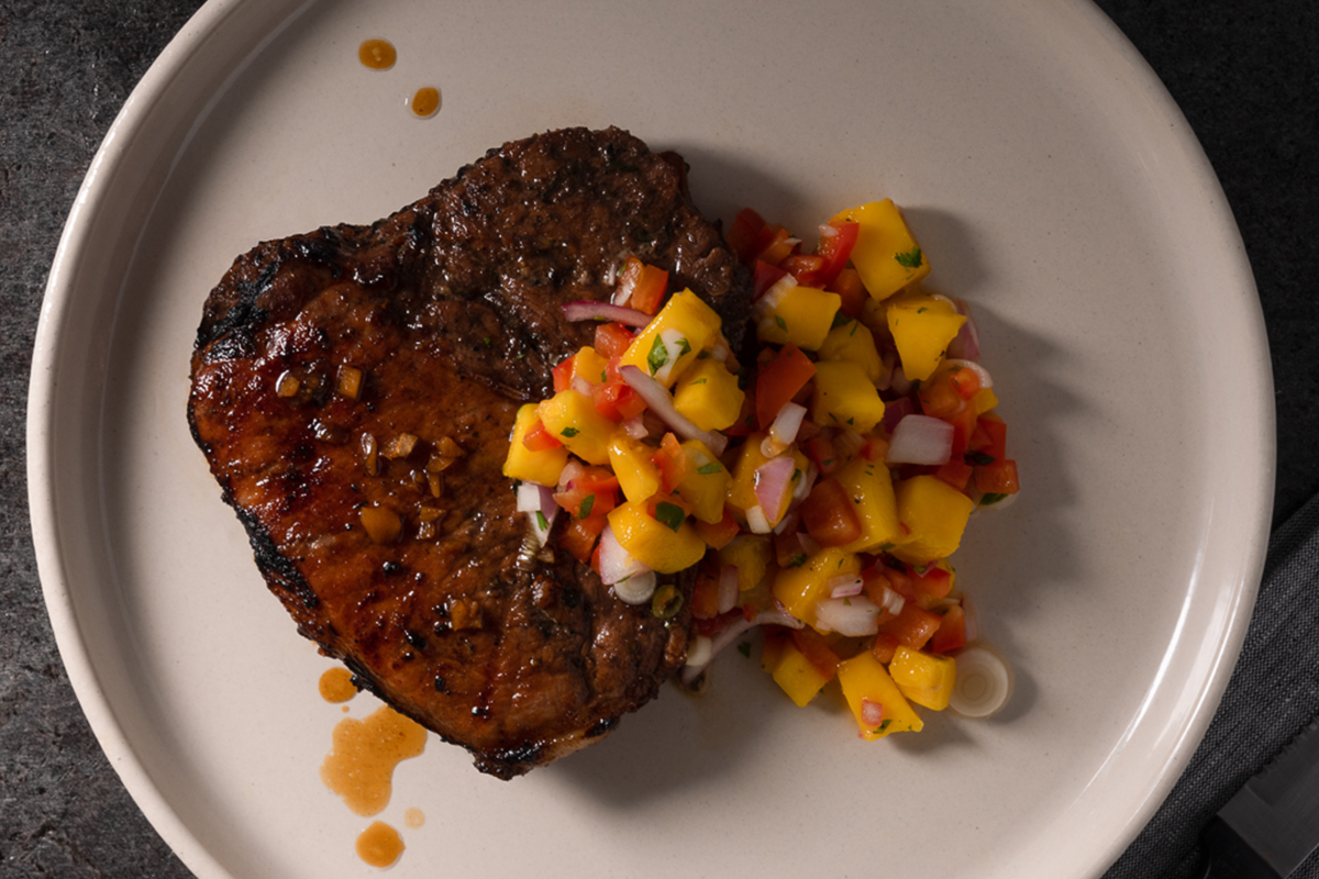 Grilled Jerk Pork Chop, Aged Rum Glaze, Mango Relish | Prairie Fresh®