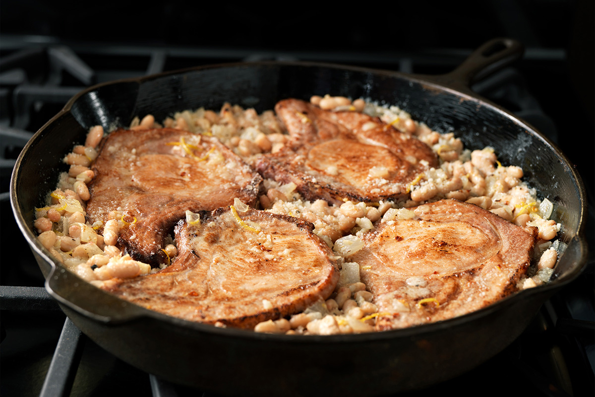 Baked Pork Loin Chops with Parmesan White Beans | Prairie Fresh®
