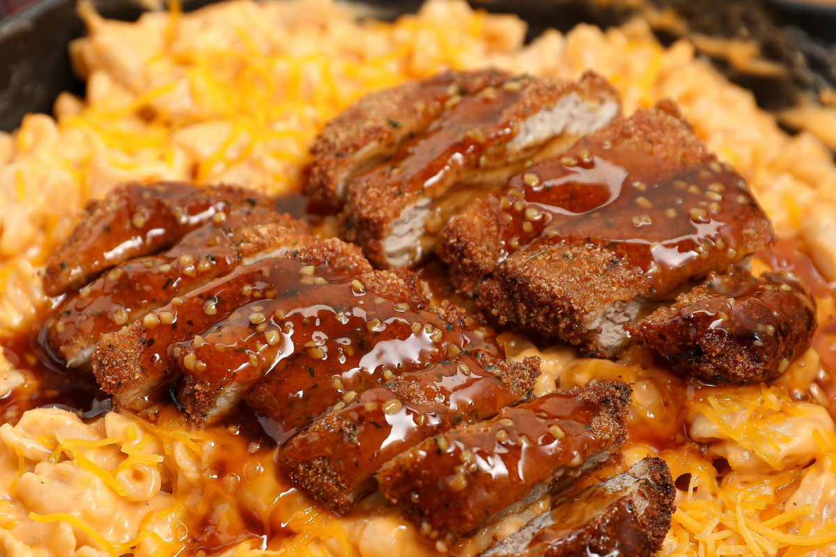 Honey Garlic Crispy Pork Tenderloin over Creamy Mac & Cheese | Prairie Fresh®